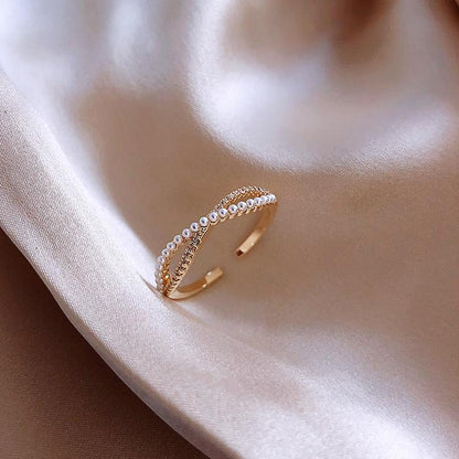CROSS BOW PEARL RING